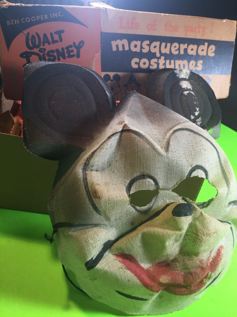An early Mickey Mouse gauze mask by Ben Cooper.